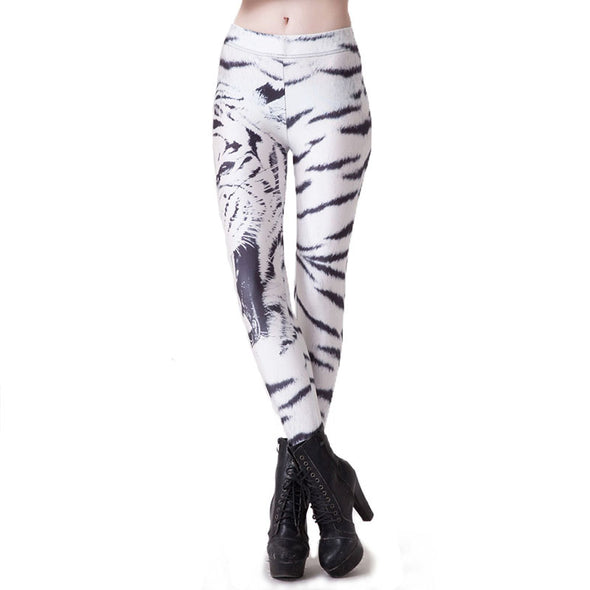 Waist down photo of model wearing white leggings with black tiger stripes