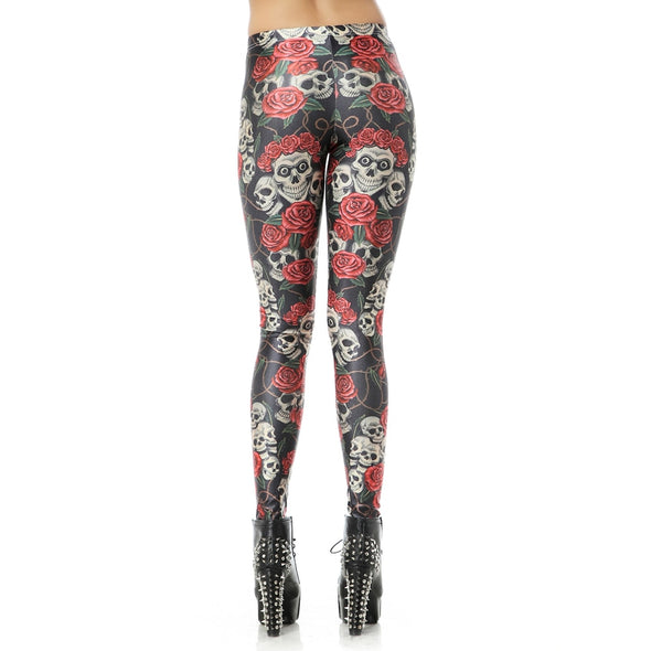 Rear view of model wearing leggings with scary skulls and roses printed on it