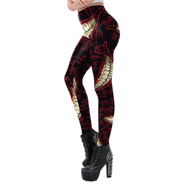 Side view of model wearing red and black leggings with pattern of evil smile and "haha" blood red lettering printed on them